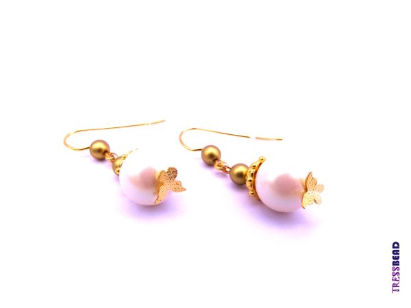 Exquisite Classic Style Earrings with White Luster Crystal Pearl, a captivating design, featuring a delicate gold-plated butterfly-shaped pin.